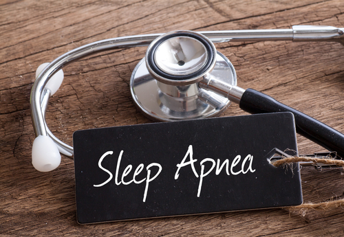 Stethoscope,on,wood,with,sleep,apnea,words,as,medical,concept